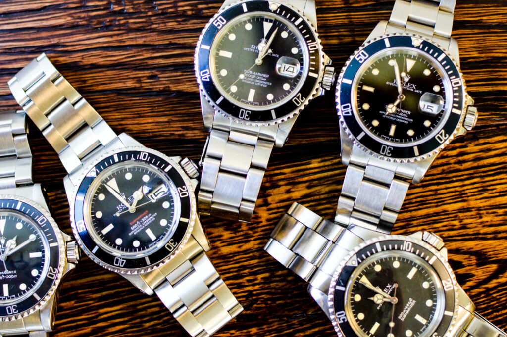 A collection of vintage Rolex Submariners. It is not recommended that you polish a vintage watch. 