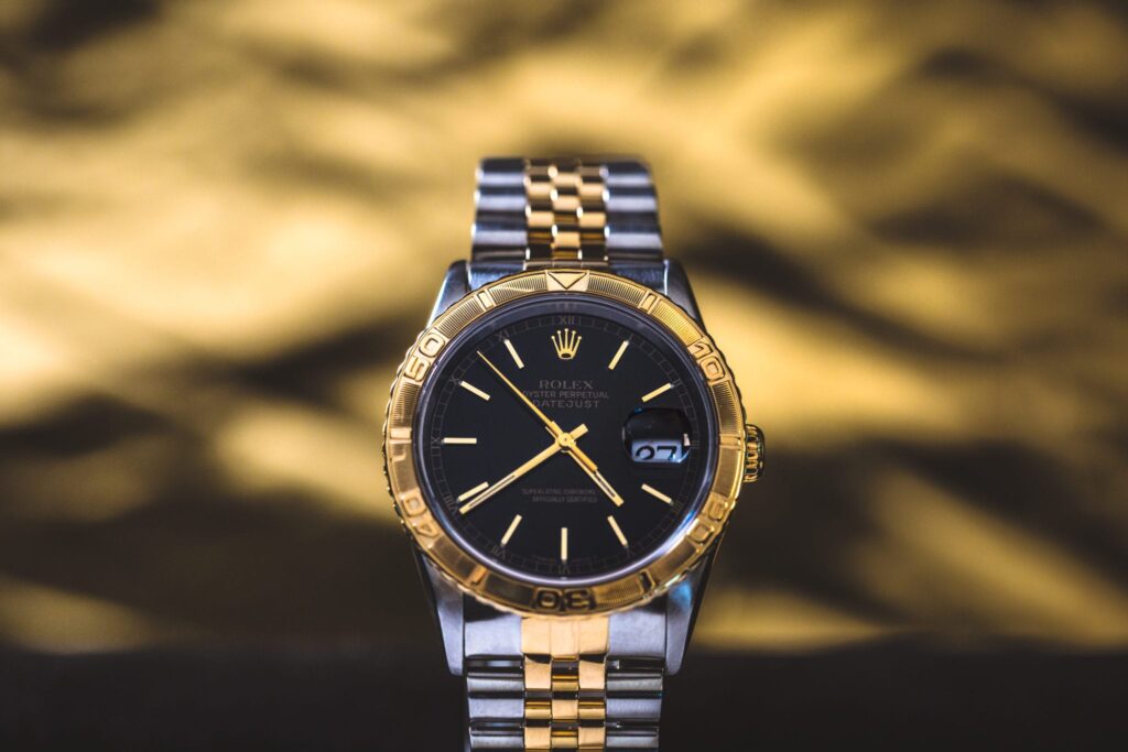 A black dial two-tone Turn-O-Graph
