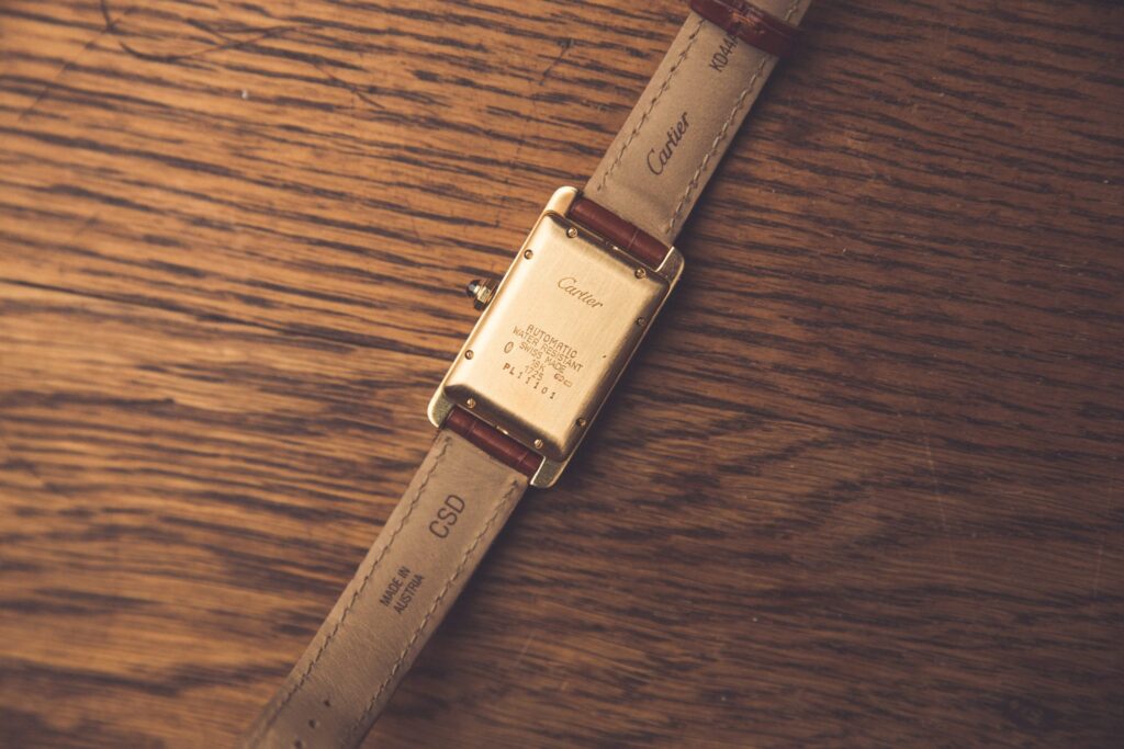 the caseback of a cartier tank 
