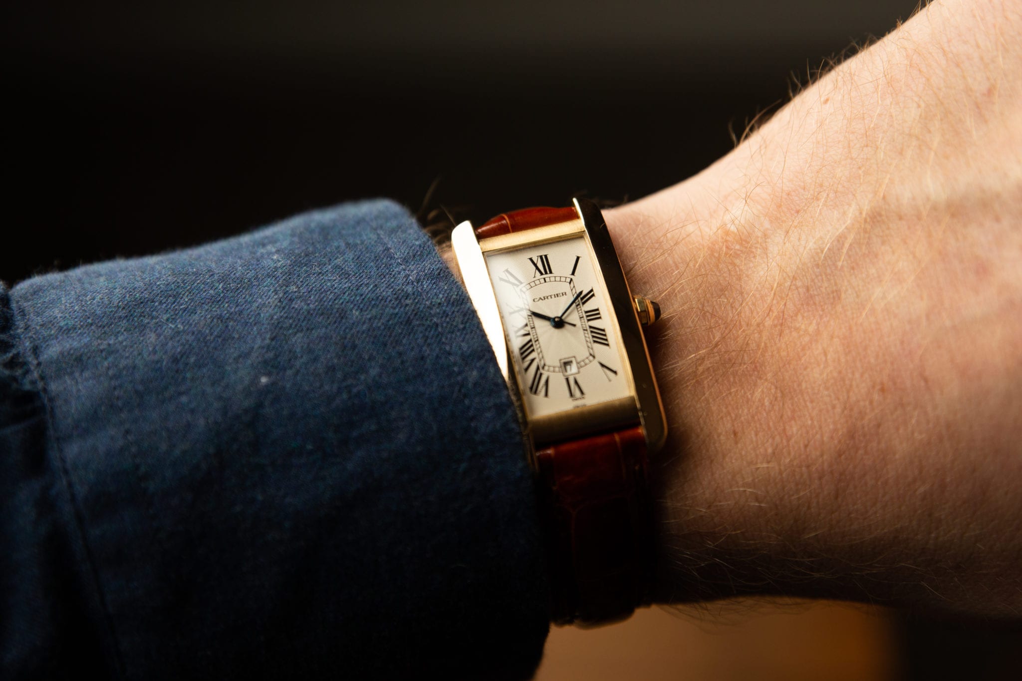 A cartier tank on the wrist